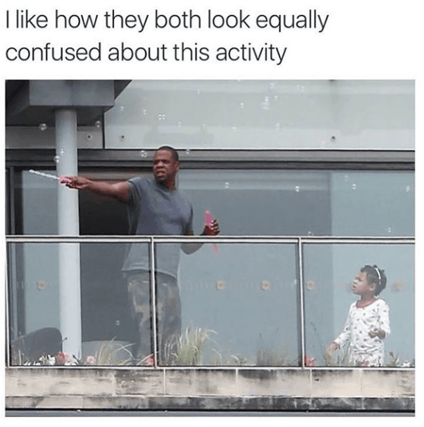 i like how they both look equally confused about this activity